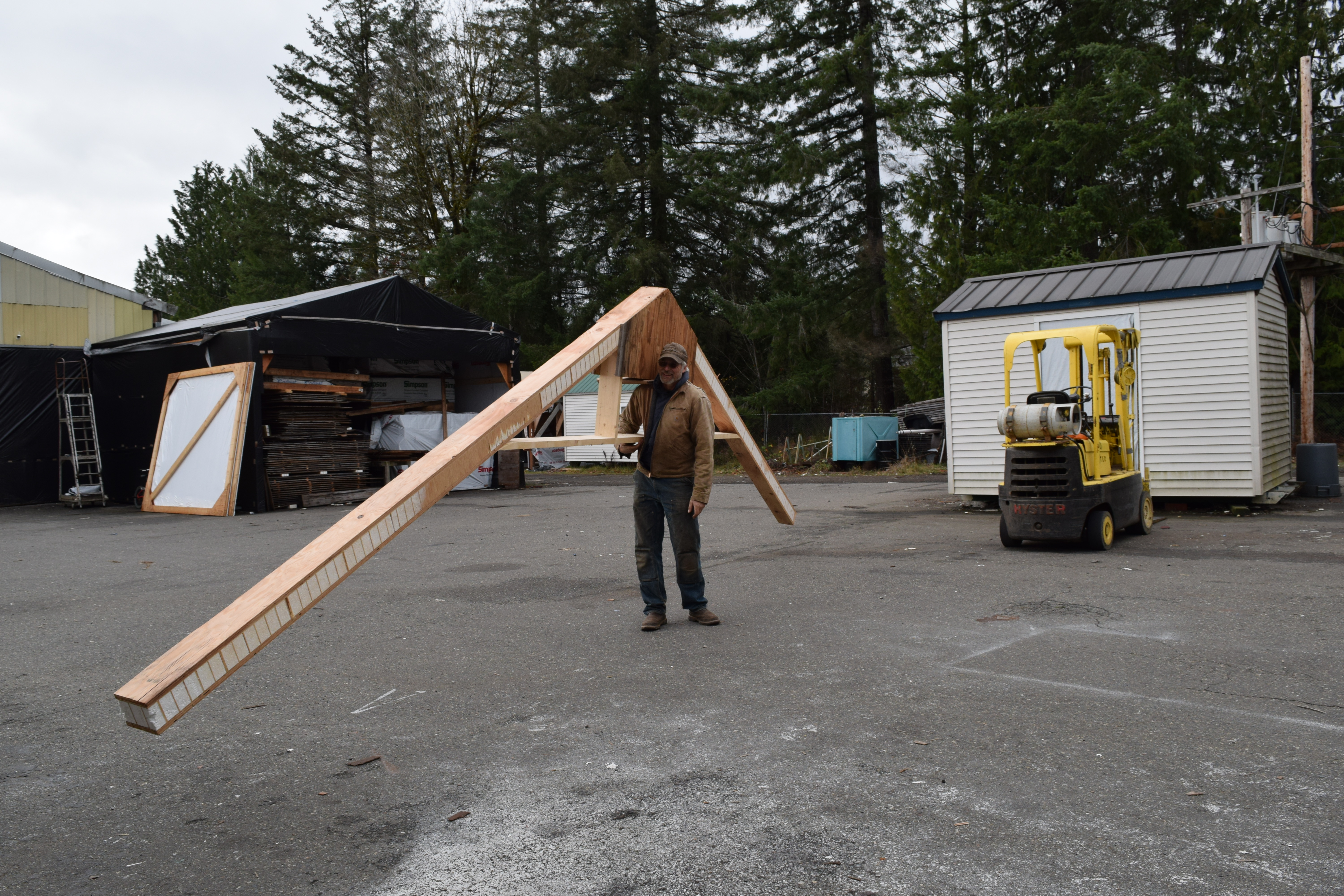 Man Holding Lightweight Post and Beam