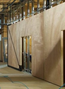 sing pivot doors in center for architecture design seattle with man doors
