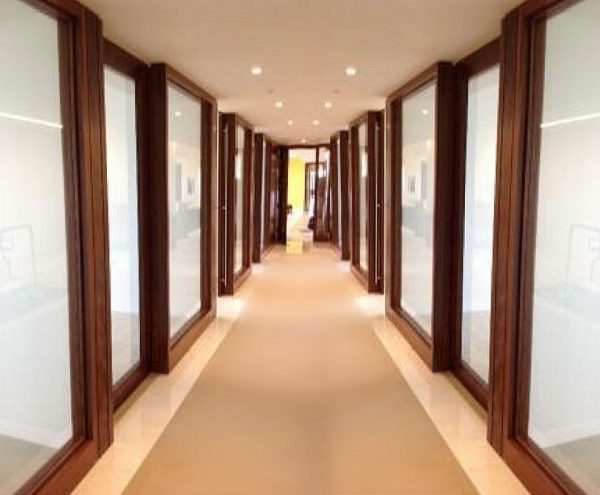 This image has an empty alt attribute; its file name is interior-sliding-doors-warp-free-sliding-wooden-french-doors-in-office-building-50-yr-guarantee-600x495.jpg