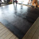 Hot rolled steel door being finished to install